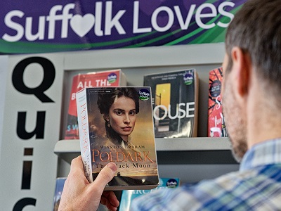 man holding a book