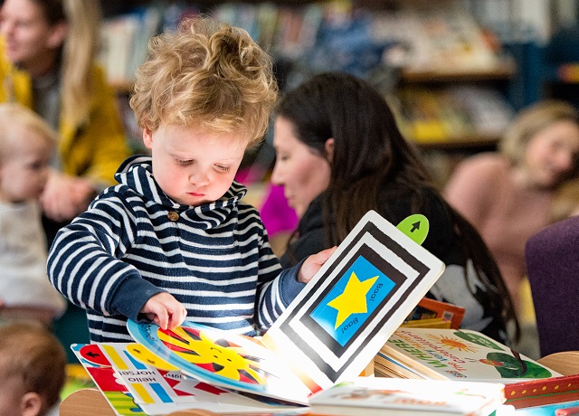 young child reading